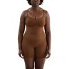 Proclaim Mid-thigh Plant-based Shapewear Bodysuit In Deep Nude