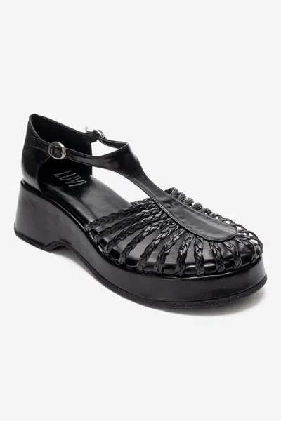 Prologue Shoes Barry Woven Wedge Sandal In Black