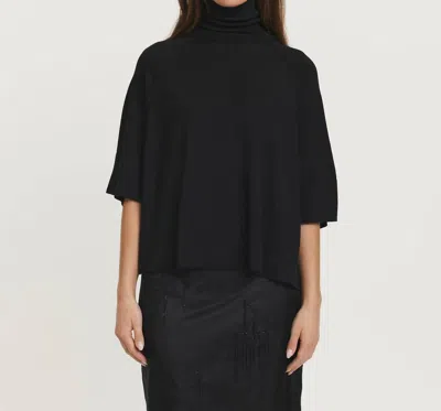 Psophia Short Sleeve Turtleneck/poncho In Black