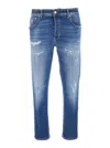 Pt Torino Blue Five Pocket Jeans With Rips And Logo Patch On The Back In Denim Man In Blue