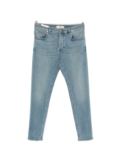 Pt Torino Faded-effect Whiskered Jeans In Blue