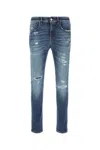 Pt Torino Stretch Denim Jeans Featuring Distressed Detailing In Blue