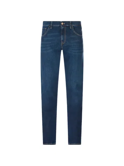 Pt Torino Logo-patch Whiskered Slim-fit Jeans In Blue