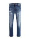 Pt Torino Blue Five Pocket Jeans With Rips And Logo Patch On The Back In Denim Man In Denim