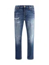 Pt Torino Blue Five Pocket Jeans With Rips And Logo Patch On The Back In Denim Man In Denim