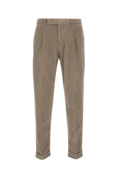 Pt01 Wide Ribbed Velvet Trousers With Tailored Pleats And Flap Pockets In Brown