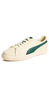 Puma Clyde Players Lane Lace Up Sneakers In Creamy Vanilla/dark Myrtle