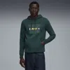 Puma Ess Logo Lab Holiday Hoodie Men In Green