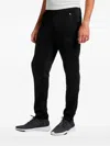 Puma Flicker Tech Track Pants In Black
