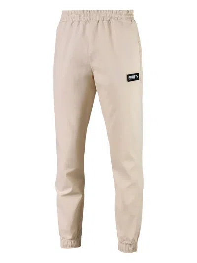 Puma Fusion Woven Track Pants In Neutral