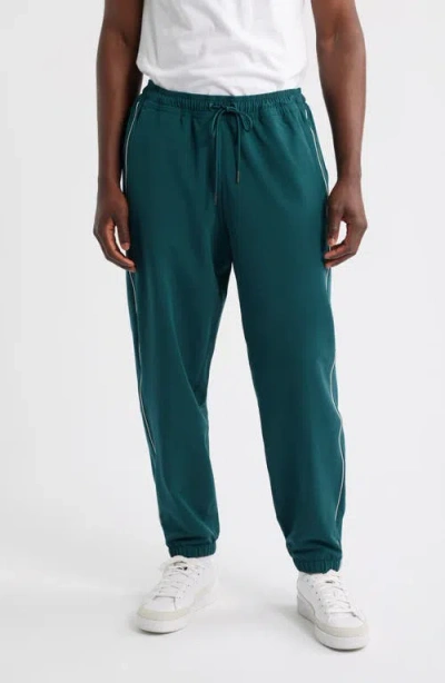 Puma Golf X Reigning Champ T7 Track Pants In Green