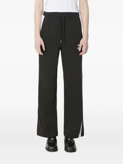Puma Iconic T7 Stripe Logo Trousers In Black