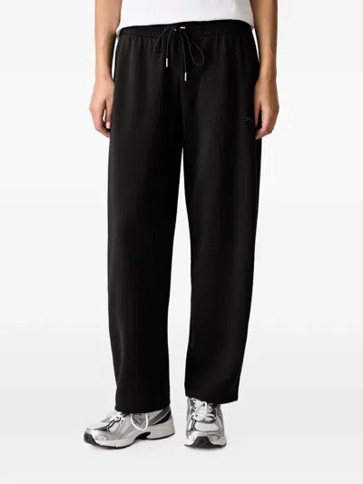 Puma Logo-embroidered Drawstring Track Pants In Black