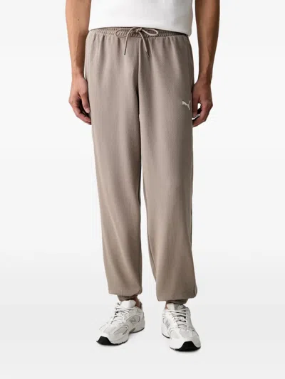 Puma Logo-embroidered Drawstring Track Pants In Neutral