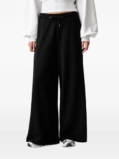 Puma Logo-embroidered Drawstring-waist Track Pants In Black
