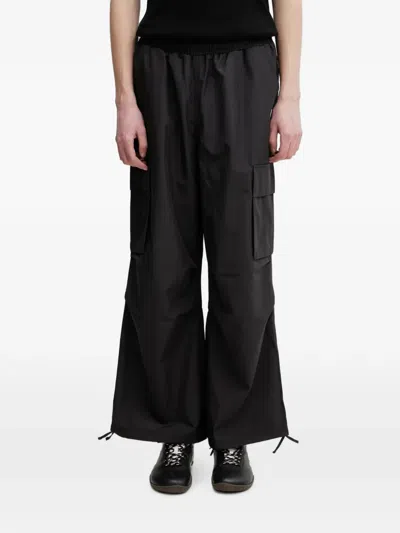 Puma Logo-embroidered Wide-leg Cargo Pants In Black