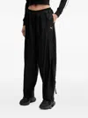 Puma Logo-print Drawstring Track Pants In Black