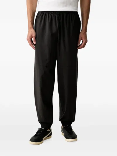 Puma Logo-print Elasticated-waist Track Pants In Multi