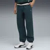 Puma Mmq Men's Relaxed Sweatpants In Green