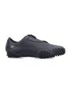 Puma 'mostro' Black Sneakers With Logo Patch On The Tongue And Studded Sole In Black