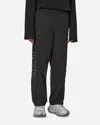 Puma X Dapper Dan Monogram-patterned Drawstring Trousers In Black
