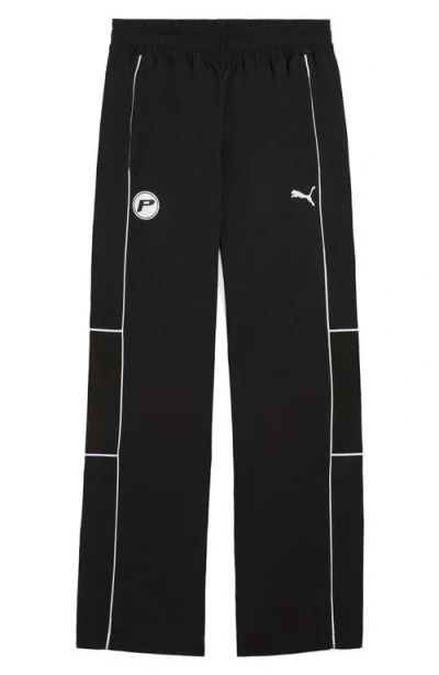 Puma Relaxed Speed Driver Series Graphic Track Trousers In  Black