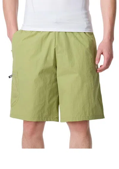 Puma Sportswear Shorts 'yellow' In Green