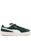 Puma Clyde Low-top Suede Sneakers In Ponderosa Pine Frosted Ivory