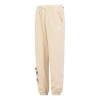 Puma Team Badge Sweatpants 'beige' In Neutral