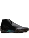 Puma X Aries Mostro Perforated Sneakers In Black