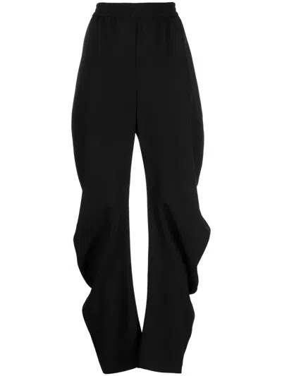 Puppets And Puppets Tapered Track Pants In Schwarz