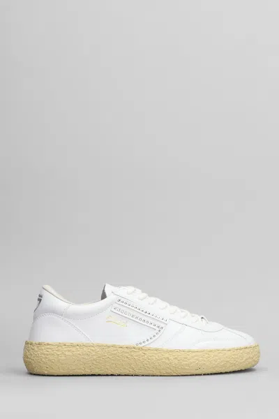 Puraai Stud Sneakers In White Leather