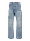 Purple Brand Blue Jeans With Logo Patch On The Rear And All-over Ripped Details In Denim Man