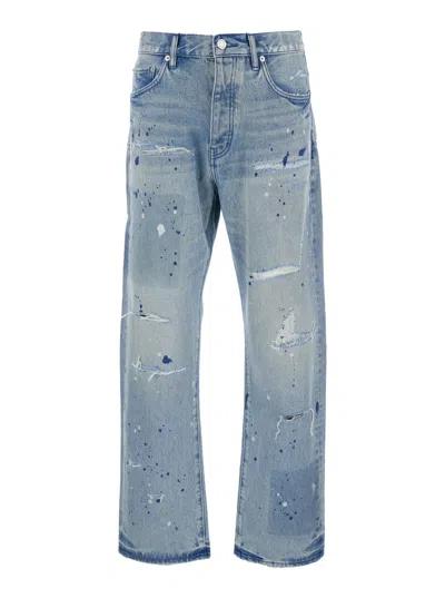 Purple Brand Blue Jeans With Logo Patch On The Rear And All-over Ripped Details In Denim Man