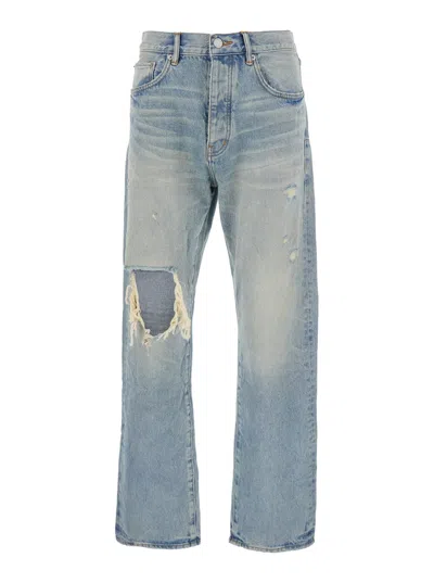 PURPLE BRAND LIGHT BLUE JEANS WITH LOGO PATCH ON THE REAR AND MAXI RIPPING ON THE FRONT IN DENIM MAN
