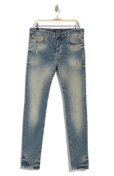 Purple Brand P001 Low Rise Skinny Jeans In Muted Dirty Indigo