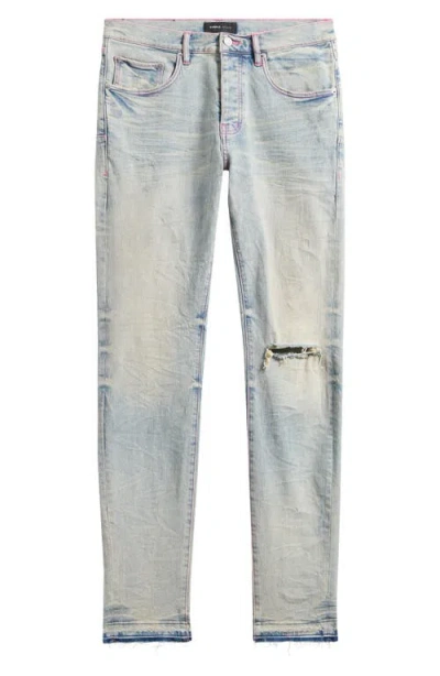 Purple Brand P001 Ripped Skinny Tapered Leg Jeans In Light Indigo