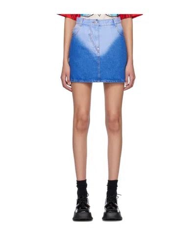 PUSHBUTTON GRADIENT DENIM MINI SKIRT