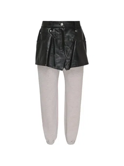 Pushbutton Mini-skirt-layered Track Pants In Black