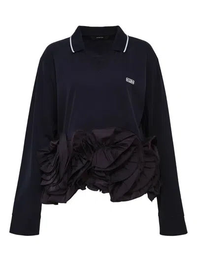 Pushbutton V-neck Ruffle-hem Polo Top In Black