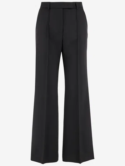 Ql2 Wool And Lyocell Trousers In Black
