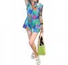 Queen Of Sparkles Denim Flower Tile Zipper Romper In Multi In Multi