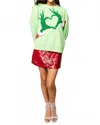 Queen Of Sparkles Grinch Heart Hands Sweatshirt In Green In Green