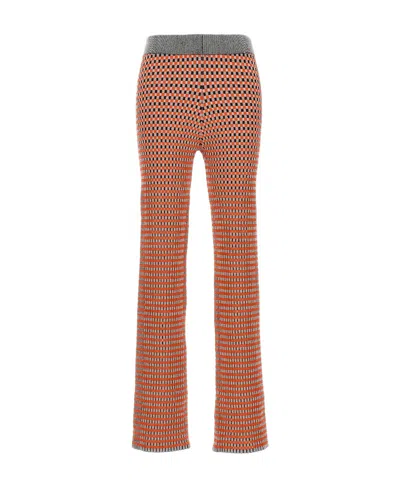 RABANNE PACO RABANNE CHECK PATTERNED SLIM FIT TROUSERS