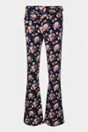 RABANNE FLOWER PRINT FLARED TROUSER IN NAVY NEON FLOWERS