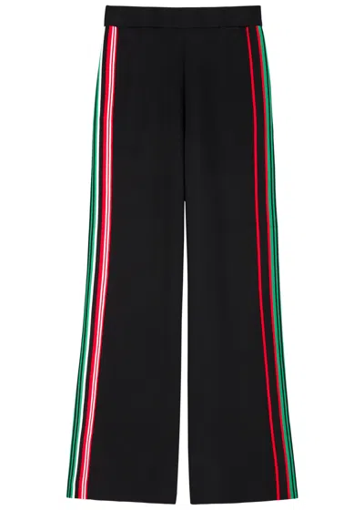 Rabanne Striped Stretch-knit Trousers In Schwarz