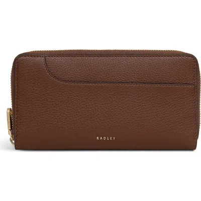 Radley Pockets Large Zip Around Wallet In Brown