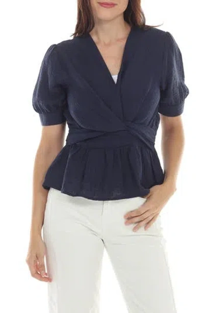 Rain And Rose Twist Front Peplum Top In Blue