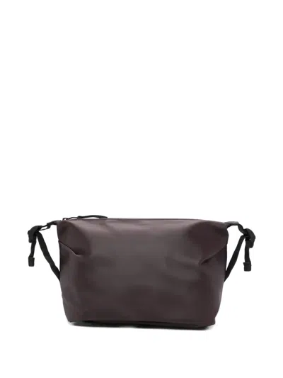 Rains Bags.. In Brown