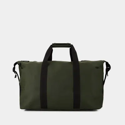Rains Logo Detailed Foldover Top Backpack In Green